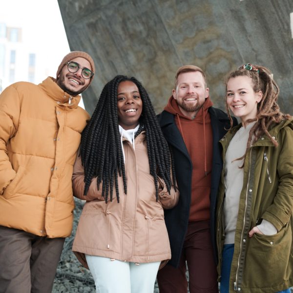 a group of young adults smiling