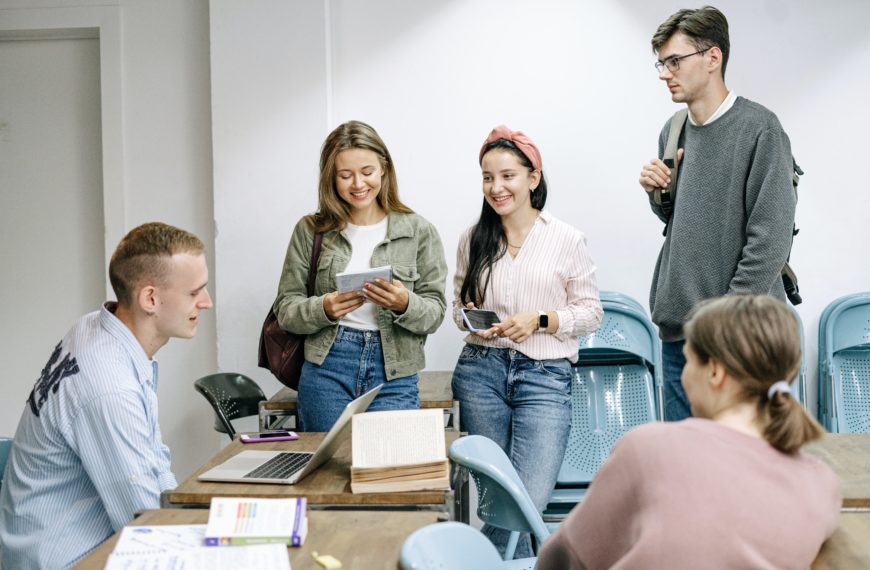 Group of students chatting and smiling